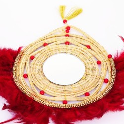 Miroir avec plumes rouges